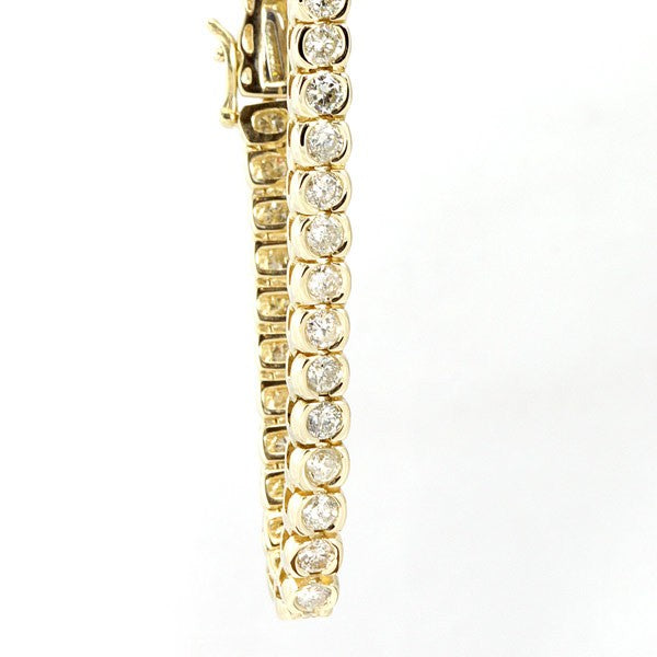 Ladies Bezel set Round Diamonds in 14K Yellow Gold Tennis Bracelet