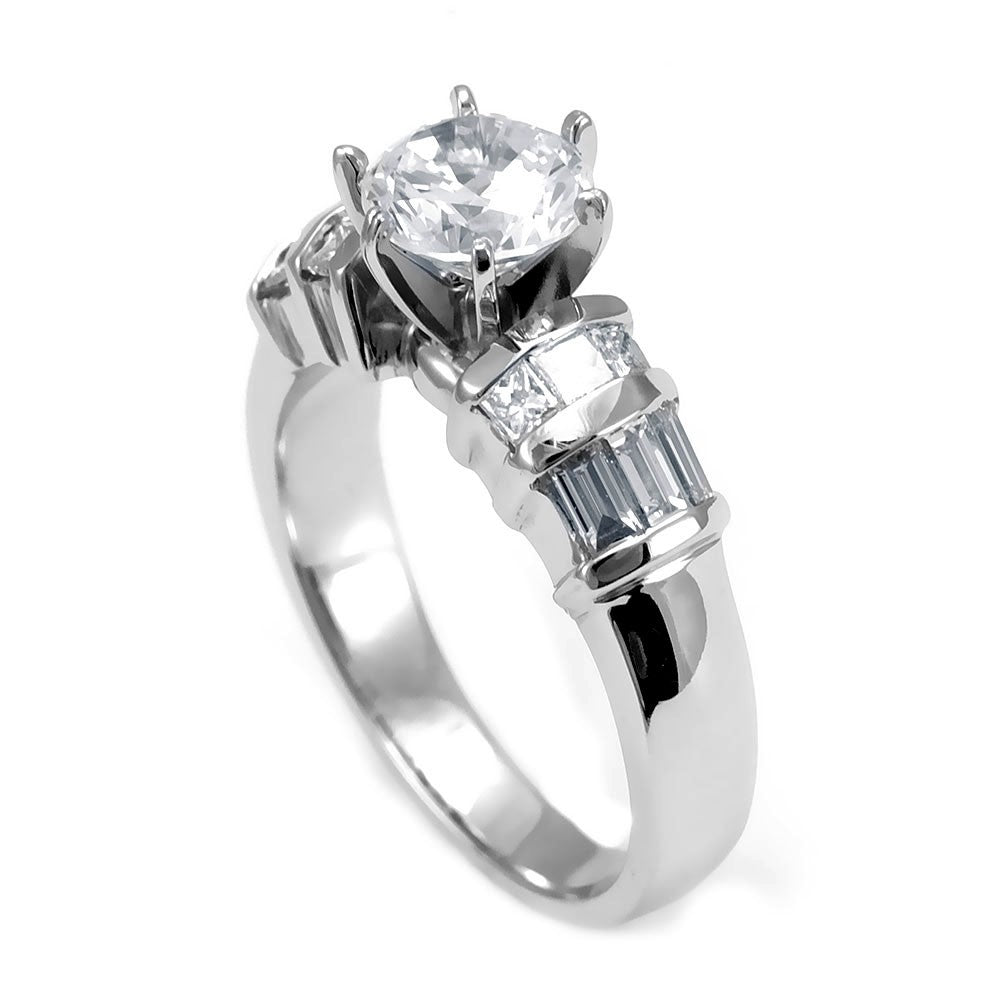 A combination of Baguette and Princess Cut Diamonds in an 18K White Gold Engagement Ring