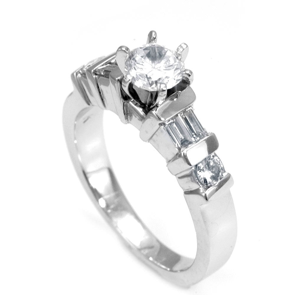 An Engagement Ring with Baguette and Princess Cut Diamonds set in 14K White Gold