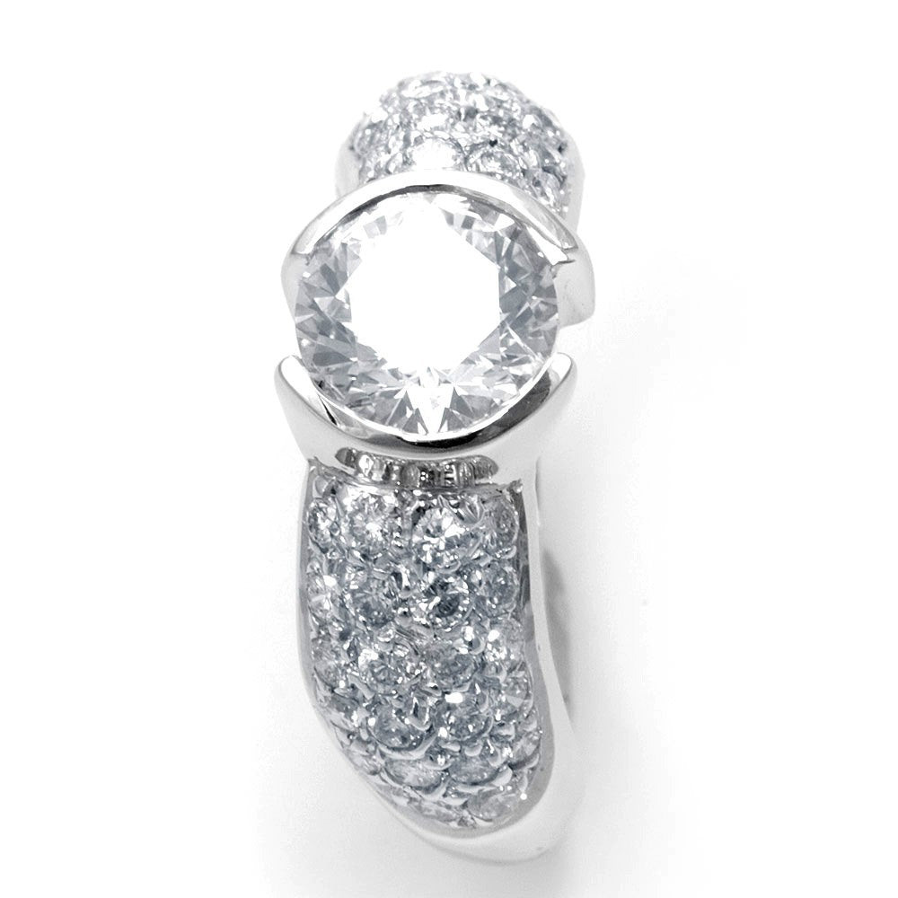 A bezel set center Engagement Ring with pave set Round Diamonds in 14K White Gold