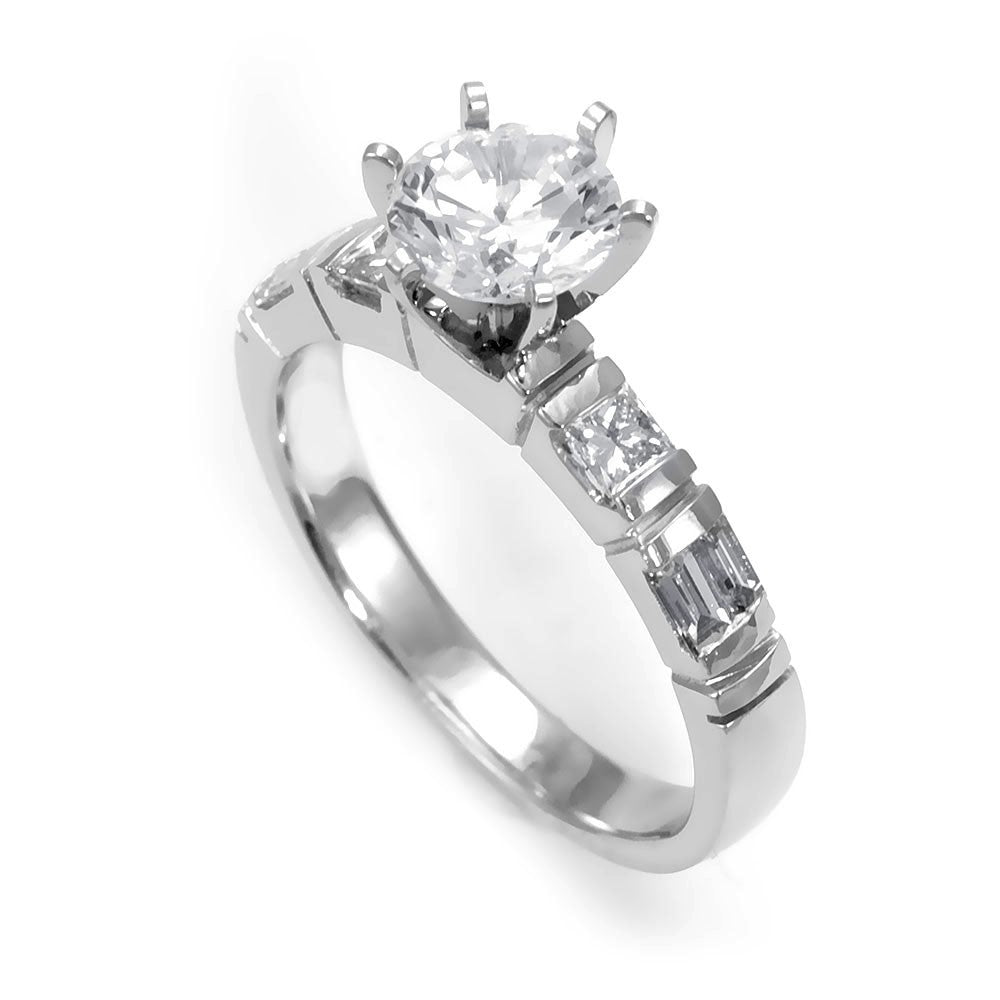 A combination of Baguette and Princess Cut Diamonds in a 14K White Gold Engagement Ring