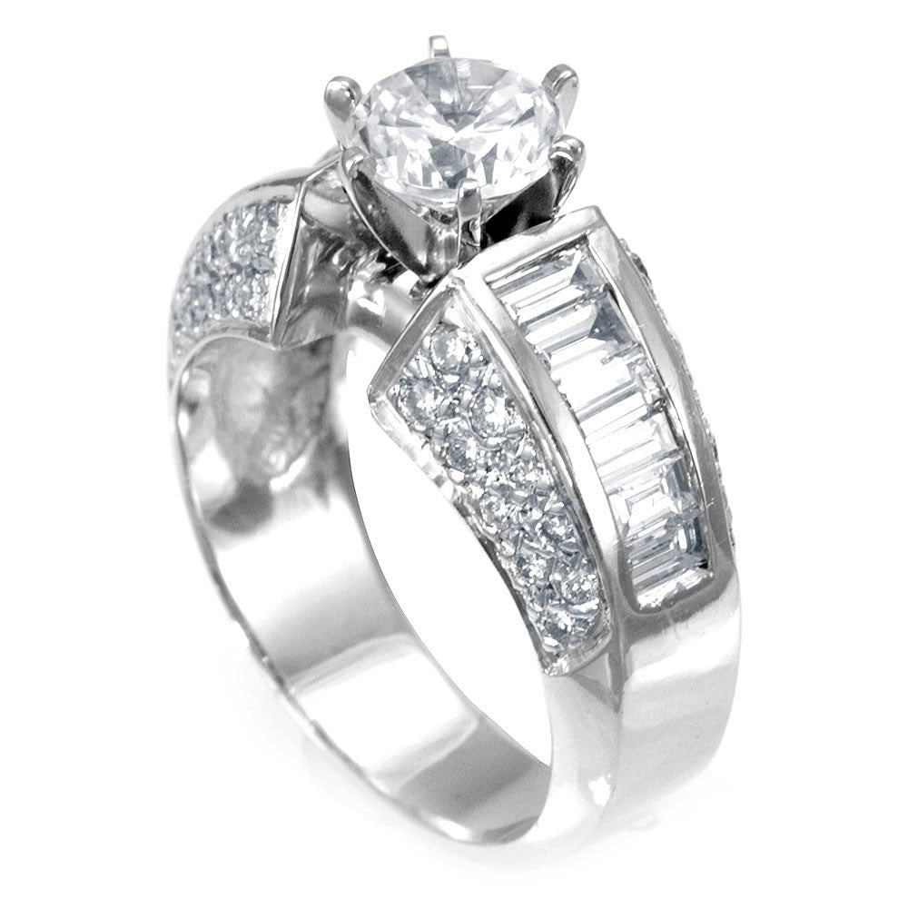 A combination of Baguette and Round Diamonds in 18K White Gold Engagement Ring
