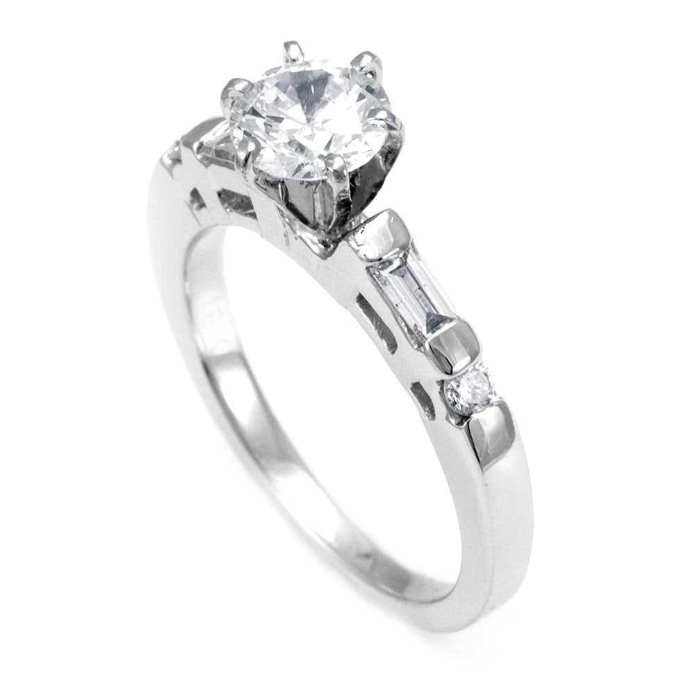 A Dainty Engagement Ring with Baguette and Round Diamonds Side Stones in 18K White Gold