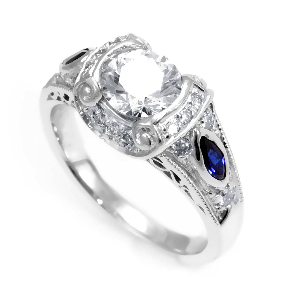 A unique Design 18K White Gold Engagement Ring with Round Diamonds and Blue Sapphire
