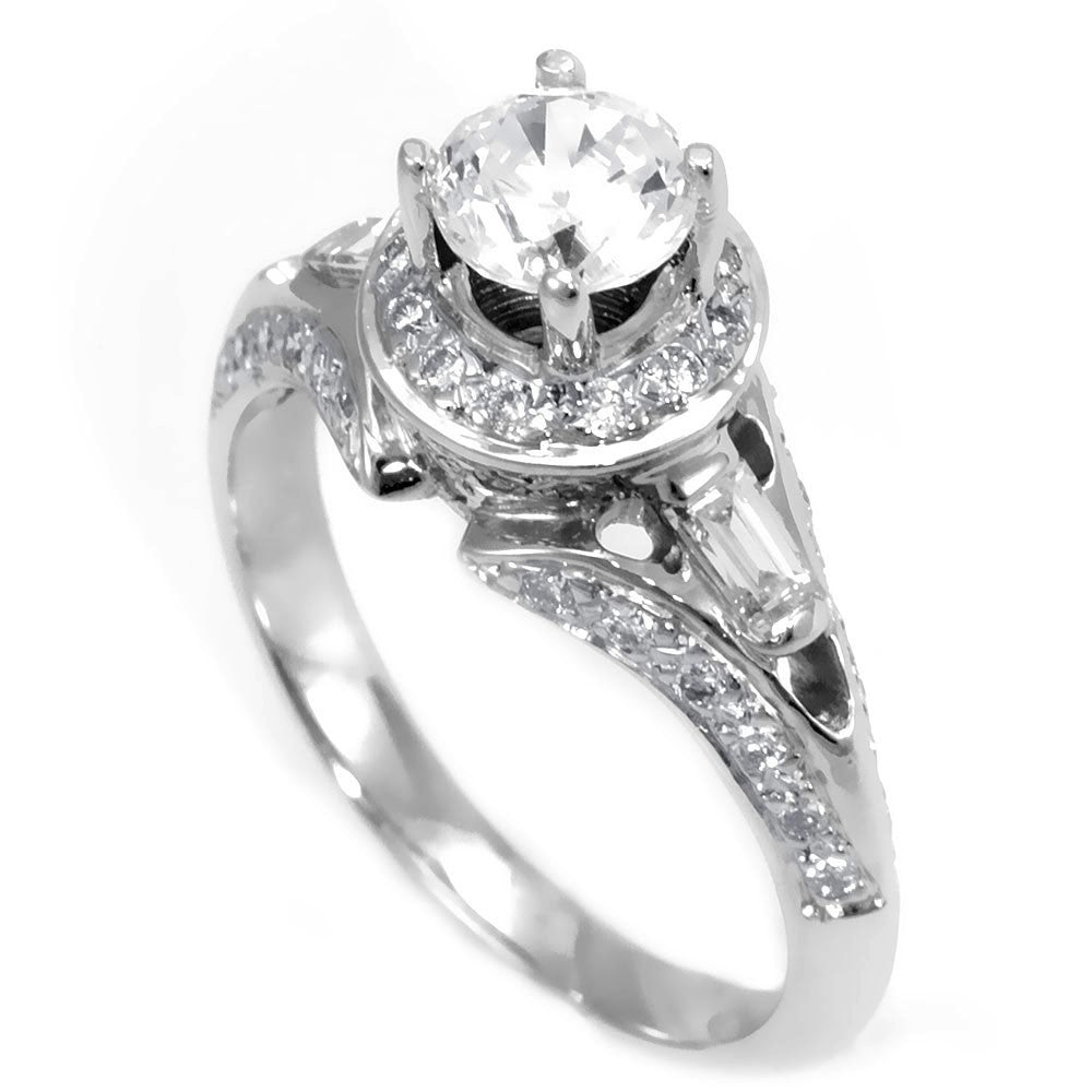 An 18K White Gold Engagement Ring with combination of Baguette and Round Diamonds and CZ center stone