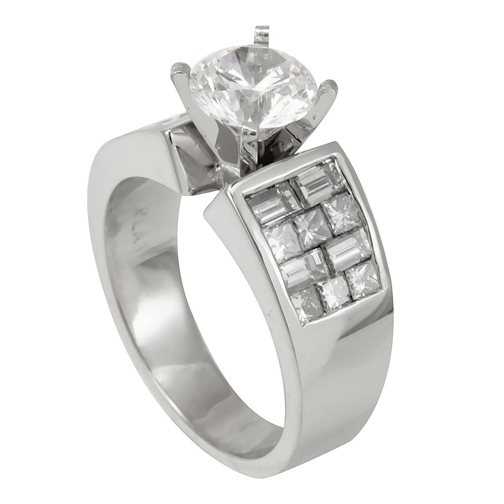 Engagement ring with Cubic Zirconia center flanked by genuine Princess cut and Baguette diamonds